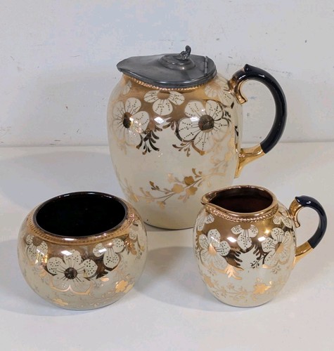 Marked golden ivory ceramic - &,