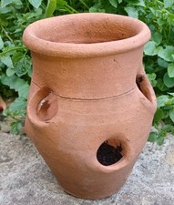 Handmade terracotta slightly