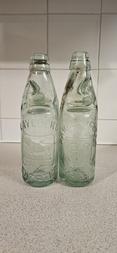 Pair antique bottles - of,