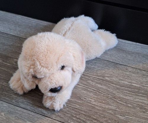 Teddy hermann laying labrador - teddy,