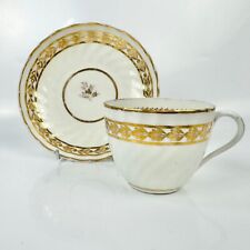 Rare Pinxton spiral-fluted tea cup and saucer in an unrecorded pattern 1796-9