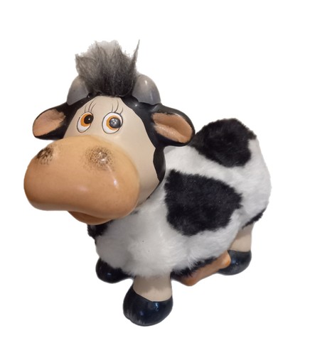 Cute fuzzy spotted cow - spotted,