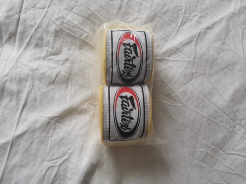 Fairtex hand wraps - hand, yellow