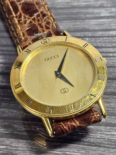 Gucci 3000m swiss quartz gold - gucci,