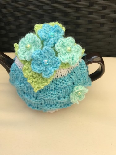 Hand knitted basket weave tea - hand,