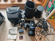 SONY Cyber-shot DSC-R1 Camera, Plus VCL-DEH17R 1.7 Conversion Lens And Adapter