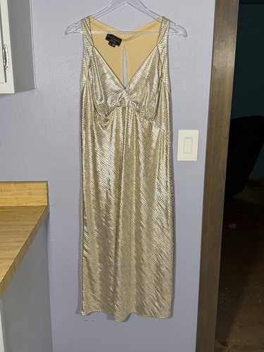 Stop staring gold sleeveless - staring,