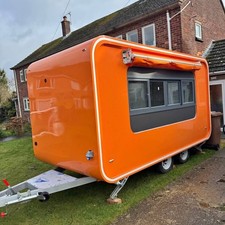Orange mobile food trailer - orange,