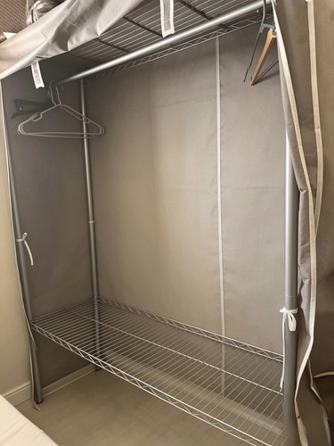 Fabric covered metal wardrobe - covered,