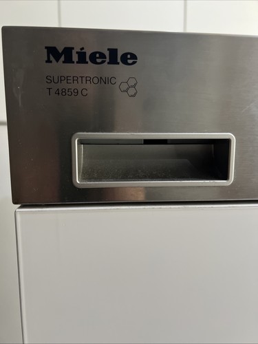Miele tumble dryer and washing - and,