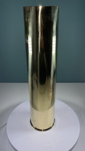Set brass artillery shell - of,