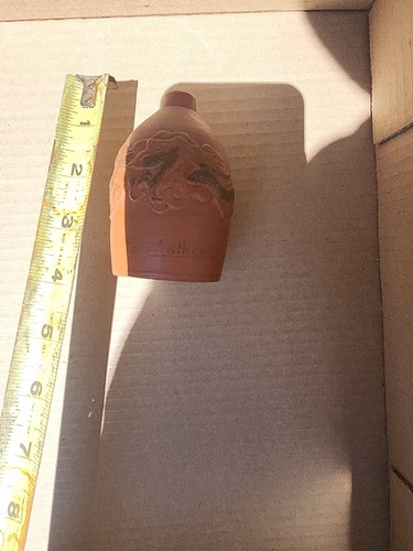 Small dragon motif clay jug - motif,