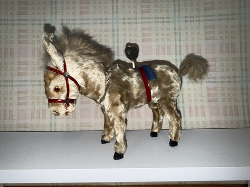 Antique donkey toy clock work