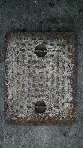 Old manhole cover - old,