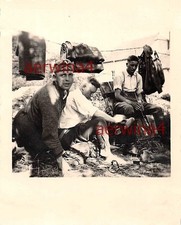 German soldier polishing shoes