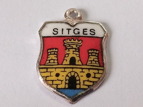 Silver travel shield charm