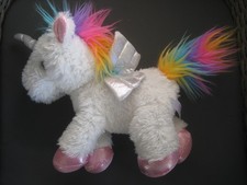 white unicorn cuddly toy with