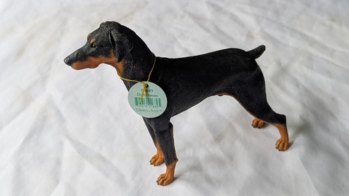 Country artists doberman - country,