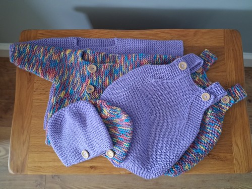 Two hand knitted - two,