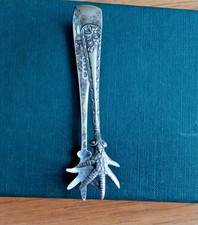 SUGAR TONGS WITH CLAW SHAPED ENDS    (Looking very worn)