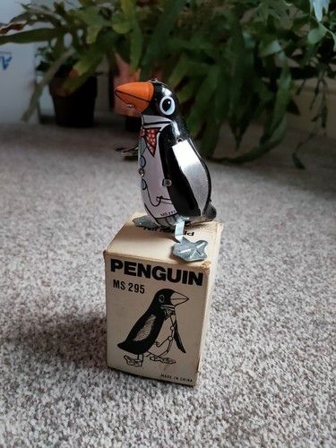 Tin toy tall with - cm,