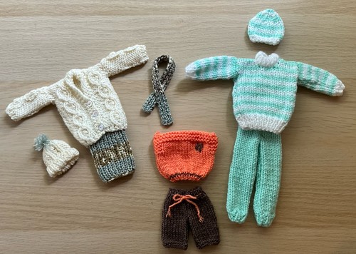 Hand knitted outfits - hand,