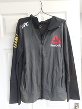 Reebok UFC Grey Black Zip Up Hoodie with Ronda Rousey Print Size Medium VGC