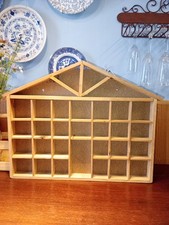 A wooden DISPLAY SHELF, HOUSE