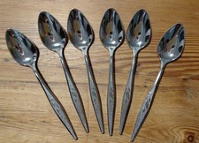 6 Oneida community stainless steel coffee spoons in Woodmere pattern. 