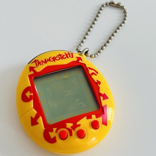 Vintage tamagotchi yellow - tamagotchi,