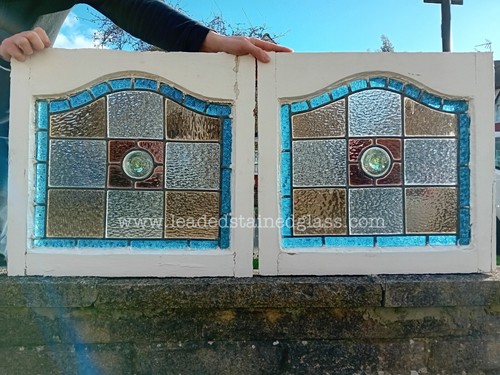 Two leaded roundel stained