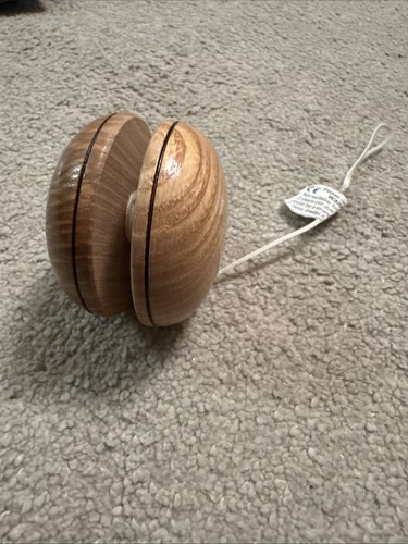 Wooden yo - yo,