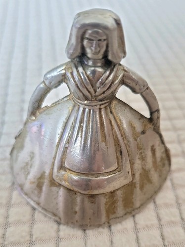 Vintage metal figurine bell