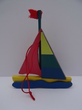 Miniature Wooden Sailing Boat Hanging Ornament. 11cm x 9cm x 1.2cm. Multicolour