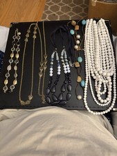 Five unbranded costume jewelry