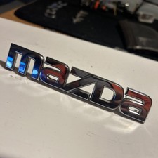 MAZDA - CAR BADGE / EMBLEM -