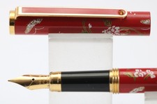 Vintage BOOTS Red Enamel