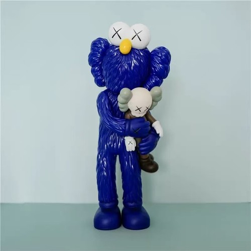 Blue kaws figure with - , baby