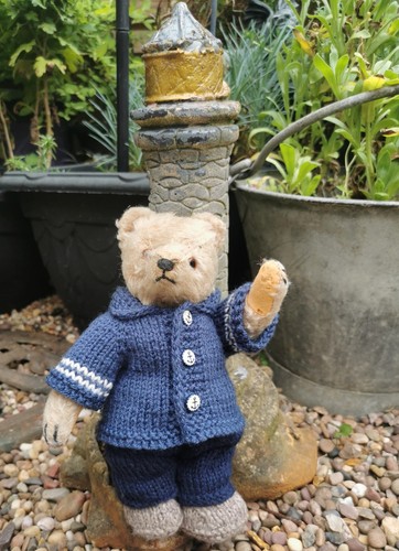 Hand knitted teddy bear - hand,