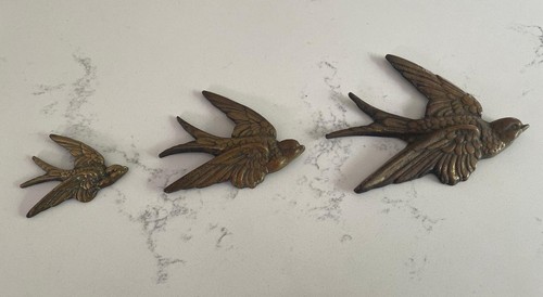 Set brass swallows in - set,