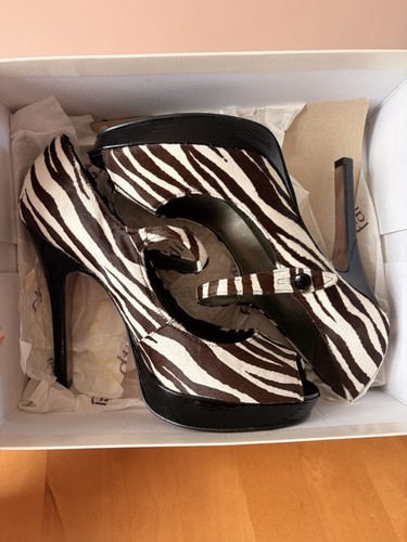 Faith zebra print pony hair - zebra,