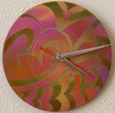 Funky UV wall clocks.. tribal clock.. .trippy.. Hippie clocks..great gift ideas