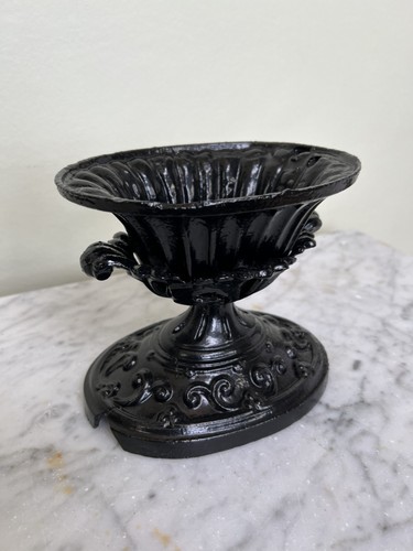 Cast iron urn - , on