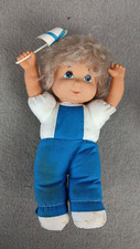 DOLL HANDS UP IN THE WORLD