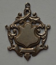 Floral Shield Antique Sterling