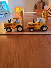 Two Sanderson Forklifts Dated