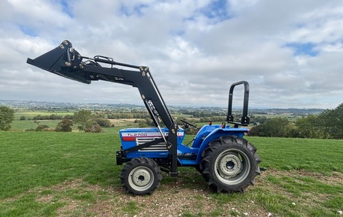Compact tractor 4in1 loader - &,