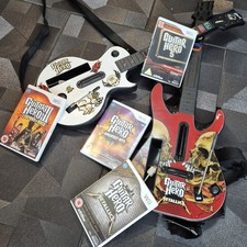 Nintendo Wii Guitar Hero Controllers & Games Bundle