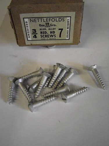 Slotted raised head - ,