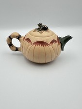 Yixing Clay Teapot with Frog Lid.  Featuring A lotus flower design